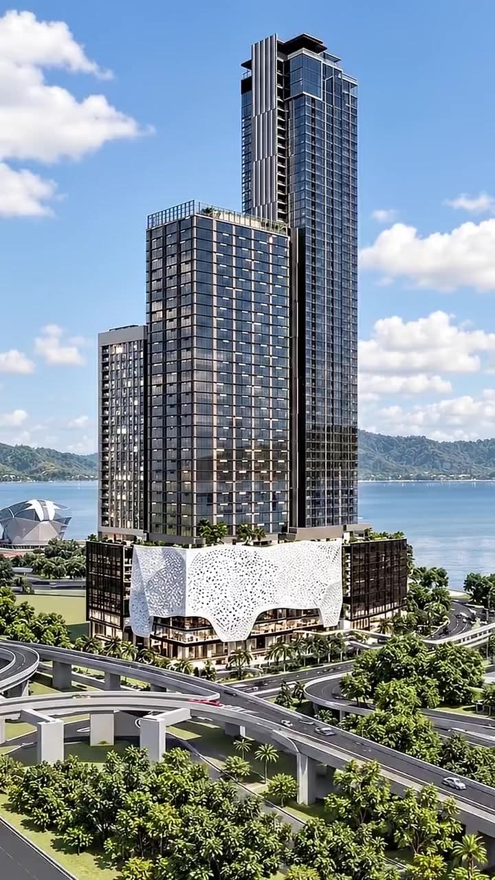 The Light Avenue tower and its lattice-wrapped podium beside the sea at The Light Waterfront, Penang. Artist’s impression.